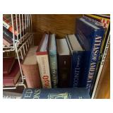 Assorted books; all in cupboard...