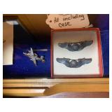 Military insignia pins with case...