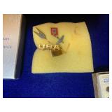 Military insignia pins with case...