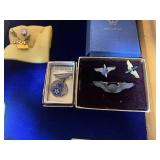 Military insignia pins with case...
