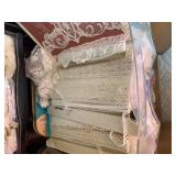 Storage display of ribbon and lace...