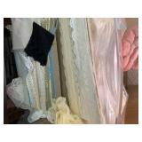 Storage display of ribbon and lace...