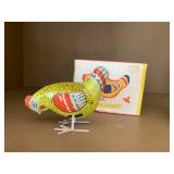 Metal jumping chicken made in the U...