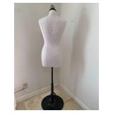 Mannequin on heavy metal base, with...