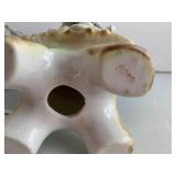 Porcelain man and woman busts, appr...