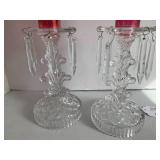 (2) Cranberry glass candle holders ...