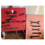 2 pegboards with old wrenches...