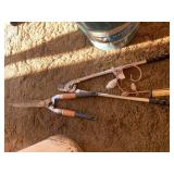 Blue tin and garden tools...