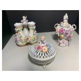 (3) German porcelain cherubs and fl...
