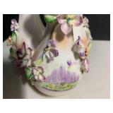 (3) German porcelain cherubs and fl...