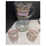 Ruffled pitchers, pink and cranberr...