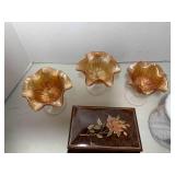 Carnival glass, lidded tea jar and ...