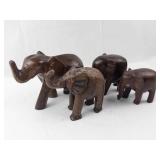 4 Elephant Figurines - Hand-Carved Brown Wood Elephants Group