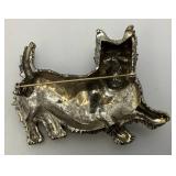 Large hefty Mid-Century Scottie Dog Brooch With Red Glass Eyes