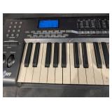 M-Audio Axiom 49 MIDI Keyboard Controller with 16 Pads & 8 Faders