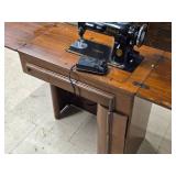 Singer Sewing Machine with Wood Flip-Top Cabinet 58" x 17" x 38"