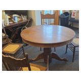 Vintage Clawfoot Wood Dining Table with (4) Wicker Seat Side Chairs