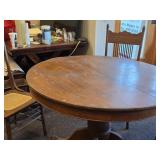Vintage Clawfoot Wood Dining Table with (4) Wicker Seat Side Chairs