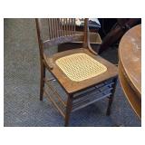 Vintage Clawfoot Wood Dining Table with (4) Wicker Seat Side Chairs