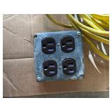 collection of various electrical extension cords and a power strip