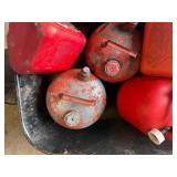Lot of various gas cans including bucket.