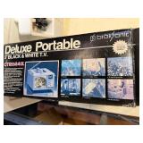 This Broksonic Deluxe Portable 5" Black and White TV (Model CTRE684UL) is a vintage electronic collectible