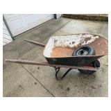 Classic Wheelbarrow with extra wheel and rim.