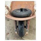 Classic Wheelbarrow with extra wheel and rim.