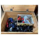 Vintage wooden storage box with contents inside