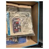 Tin storage box with misc contents