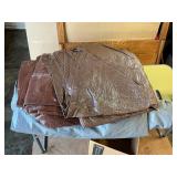 Miscellaneous tarps of various sizes and a cover for car or boat