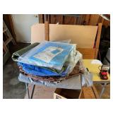 Miscellaneous tarps of various sizes and a cover for car or boat
