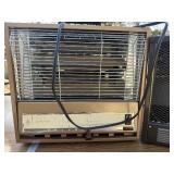 Two vintage Arvin space heaters.