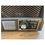 Two vintage Arvin space heaters.