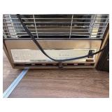 Two vintage Arvin space heaters.