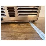 Two vintage Arvin space heaters.