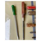 Lot of Large screw drivers.