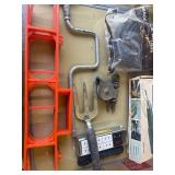 Box of various tools, grinding wheel, c clamps and more