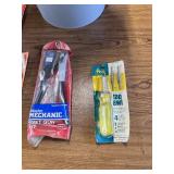 5 Gallon job site bib and various hooks and tools.