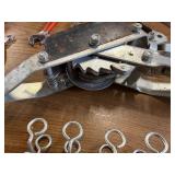 Box of tools including a come along and various hardware ect