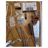 Box of tools including a come along and various hardware ect