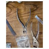 Box of tools including a come along and various hardware ect