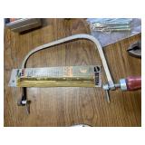 Box of tools including a come along and various hardware ect