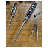 Bits, pipe insulation, grass clipper , screw drivers