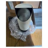 Floor lamp , powers up. Comes in box and wrapping