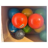 Lot of various balls , softball, croquet , baseball, golf