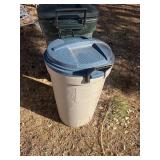 Two Rubbermaid garbage containers
