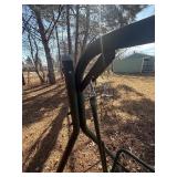 metal patio swing in green , in decent shape