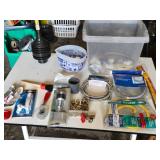 Plumbing and Hardware Tools and Supplies including Washing Machine Hose, Water Heater Connector, and Various Fittings