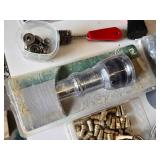 Plumbing and Hardware Tools and Supplies including Washing Machine Hose, Water Heater Connector, and Various Fittings